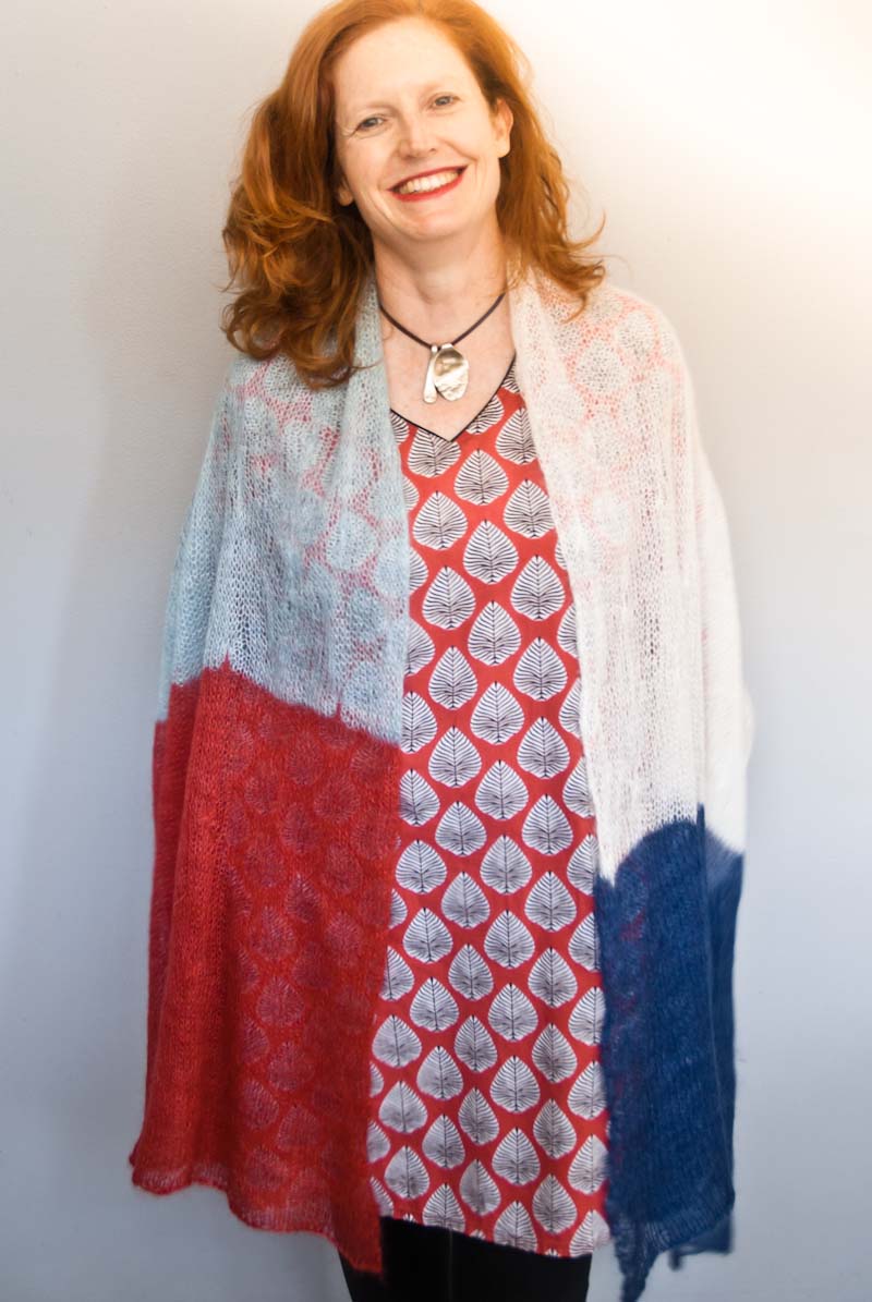 Bridget Henderson of Cowgirlblues wearing her hand knit pattern Kidsilk Cobweb Shawl